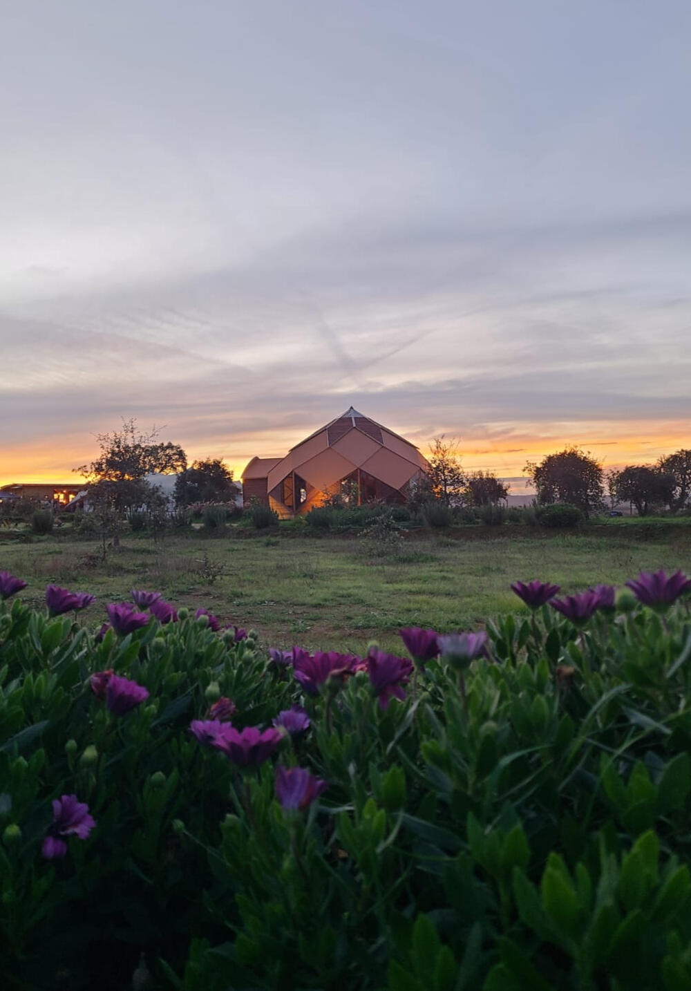 Zome Dome at sunset, geodesic ceremony space for the plant medicine sessions at the 5Rhythms & Plant Medicine Retreat in Alentejo, Portugal.